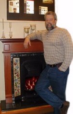 Jerry Neal by fireplace